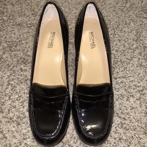 Michael Kors black wide heeled penny loafers